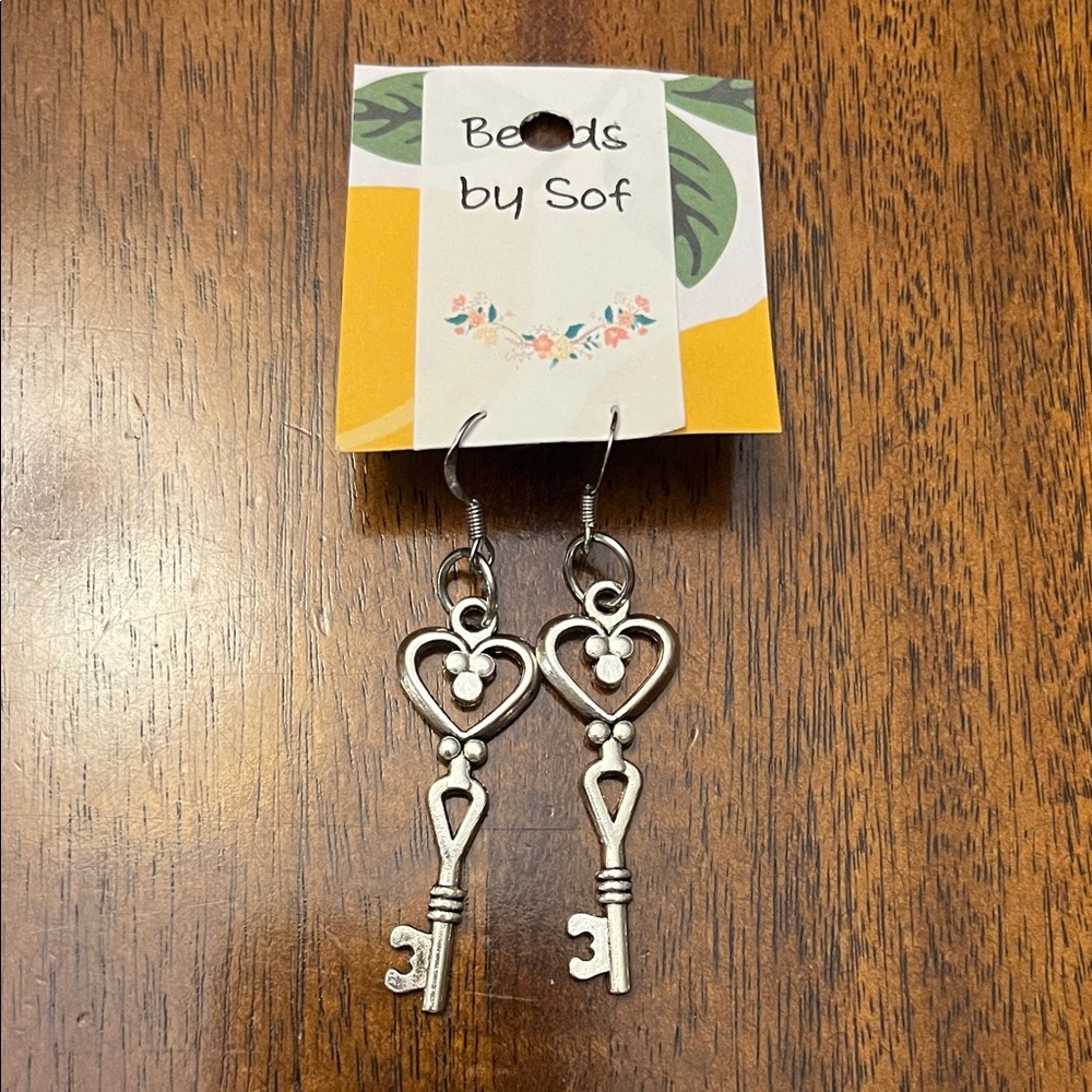 NWT silver key earrings